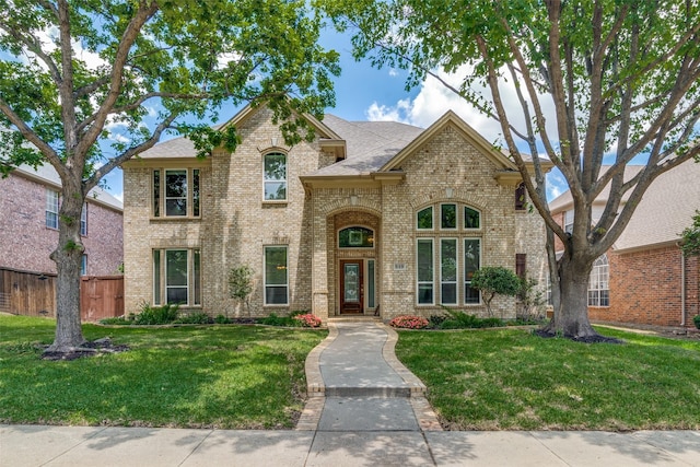 519 Butternut Dr, Garland, TX 75044 - french country home featuring brick siding
