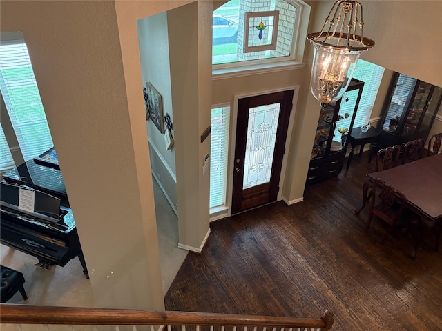 519 Butternut Dr, Garland, TX 75044 - entrance foyer with wood finished floors and baseboards