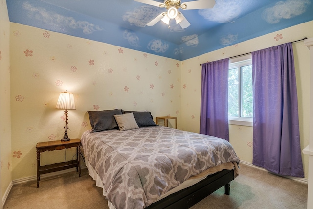 519 Butternut Dr, Garland, TX 75044 - carpeted bedroom featuring baseboards and a ceiling fan