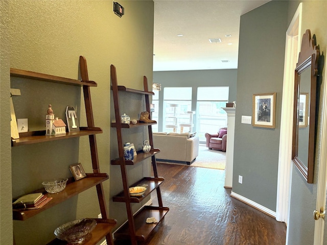 519 Butternut Dr, Garland, TX 75044 - corridor with wood finished floors and baseboards