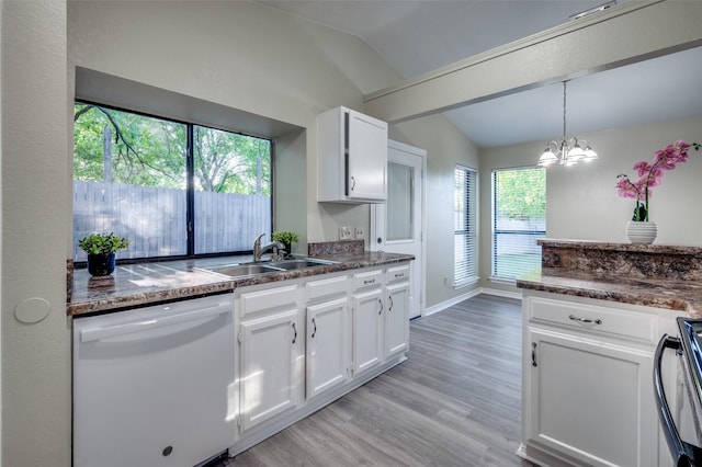 2702 Glen Ridge Dr, Arlington, TX 76016 - kitchen with dishwasher, a sink, lofted ceiling, dark countertops, and white cabinets