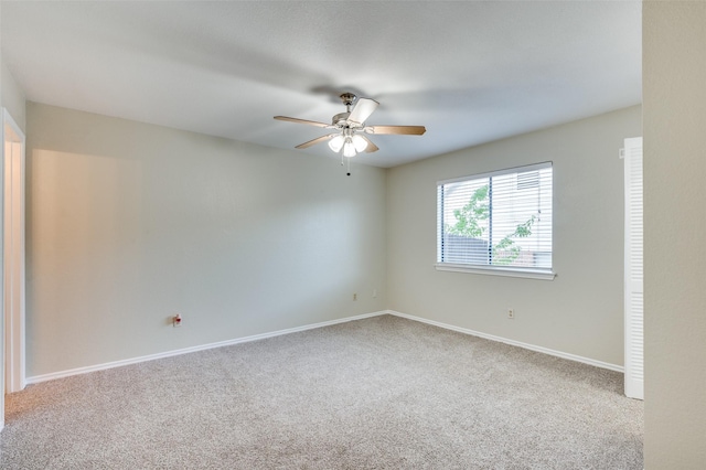 2702 Glen Ridge Dr, Arlington, TX 76016 - carpeted empty room featuring a ceiling fan and baseboards