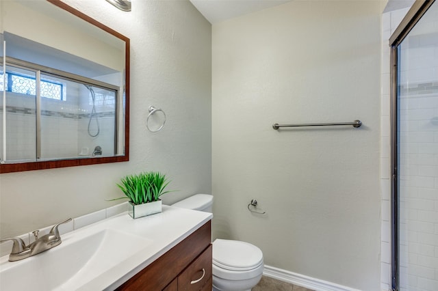 2702 Glen Ridge Dr, Arlington, TX 76016 - full bath with toilet, a tile shower, and vanity