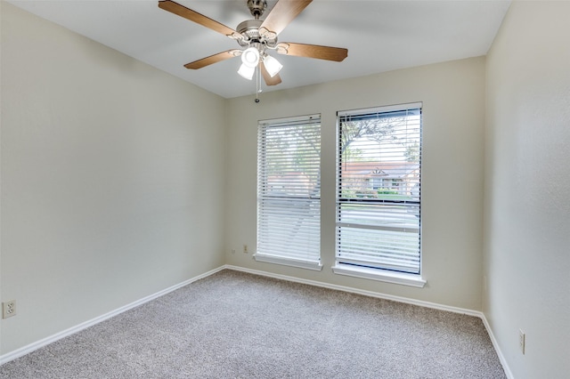 2702 Glen Ridge Dr, Arlington, TX 76016 - spare room with carpet flooring, baseboards, and ceiling fan