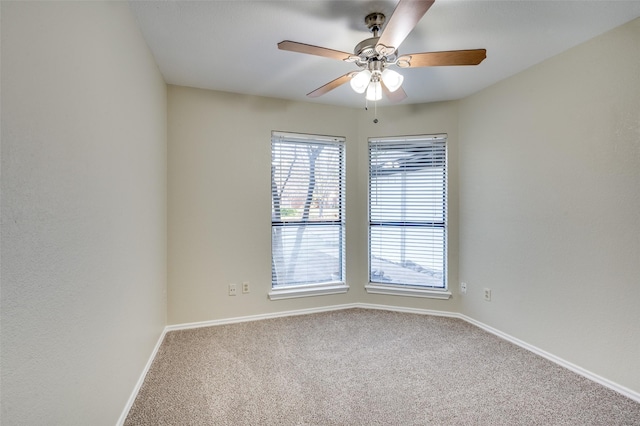 2702 Glen Ridge Dr, Arlington, TX 76016 - carpeted empty room with baseboards and a ceiling fan