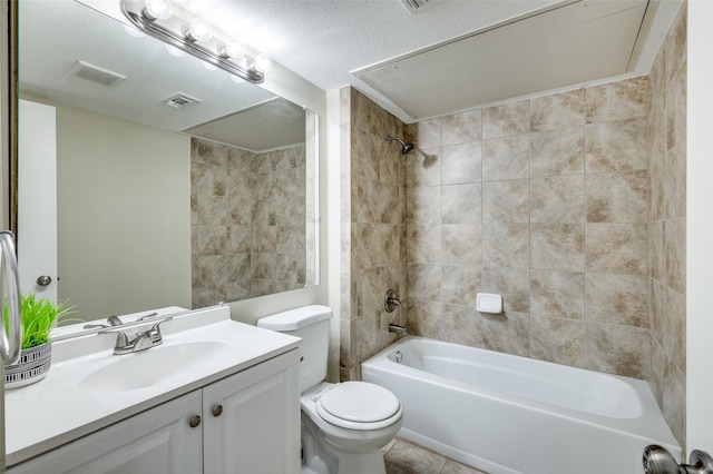 2702 Glen Ridge Dr, Arlington, TX 76016 - bathroom with toilet, tub / shower combination, vanity, and tile patterned flooring
