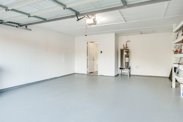 2702 Glen Ridge Dr, Arlington, TX 76016 - garage with electric water heater and a garage door opener