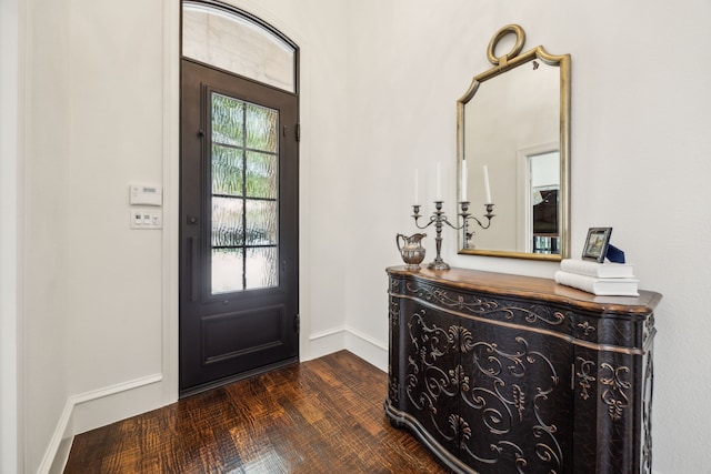 1675 Morris Ln, Frisco, TX 75034 - entryway featuring baseboards and dark wood-style flooring