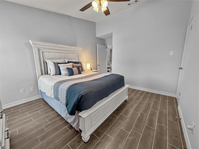 2114 Cottage Oak Ln, Colleyville, TX 76034 - bedroom featuring dark wood-style flooring, baseboards, and ceiling fan