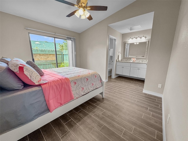 2114 Cottage Oak Ln, Colleyville, TX 76034 - bedroom featuring ensuite bath, baseboards, wood finished floors, access to exterior, and lofted ceiling