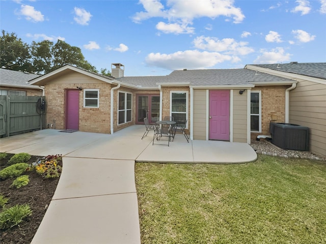 2114 Cottage Oak Ln, Colleyville, TX 76034 - rear view of property with brick siding, cooling unit, a chimney, and a patio