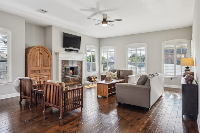 760 Del Carmen Dr, Prosper, TX 75078 - living area featuring ceiling fan, dark wood-style floors, a fireplace, and baseboards