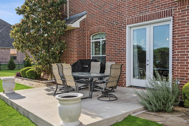 760 Del Carmen Dr, Prosper, TX 75078 - view of patio with french doors, fence, and outdoor dining area
