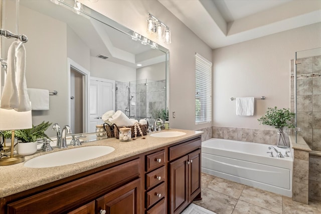 402 Pebble Beach Dr, Frisco, TX 75036 - full bath with a shower stall, a garden tub, tile patterned flooring, double vanity, and a tray ceiling