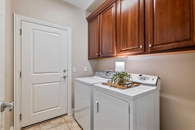 402 Pebble Beach Dr, Frisco, TX 75036 - laundry room with separate washer and dryer, cabinet space, and light tile patterned floors