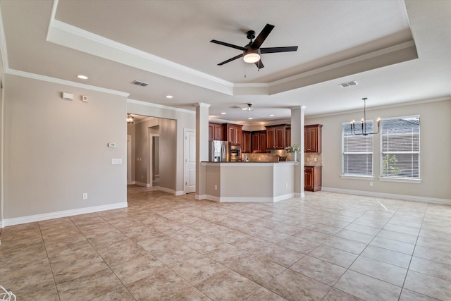 402 Pebble Beach Dr, Frisco, TX 75036 - unfurnished living room featuring a tray ceiling, a chandelier, a ceiling fan, crown molding, and recessed lighting