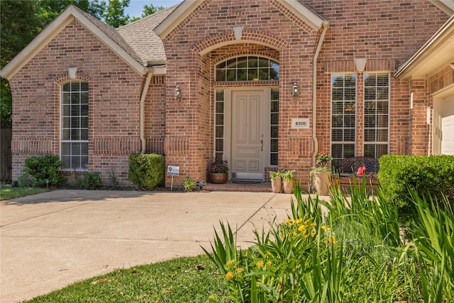 4301 Sandra Lynn Dr, Flower Mound, TX 75022 - doorway to property featuring brick siding