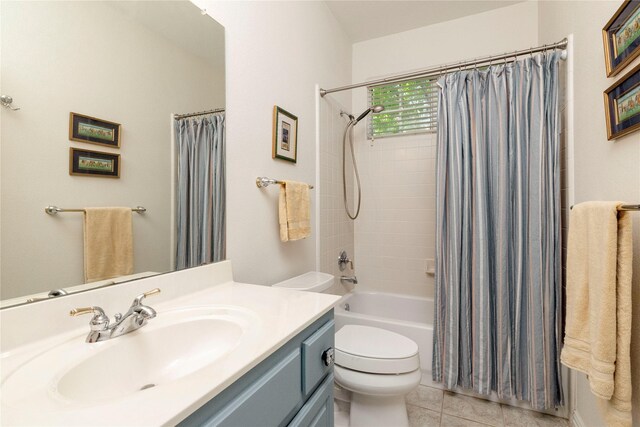 4301 Sandra Lynn Dr, Flower Mound, TX 75022 - full bathroom featuring toilet, vanity, tile patterned floors, and shower / tub combo with curtain