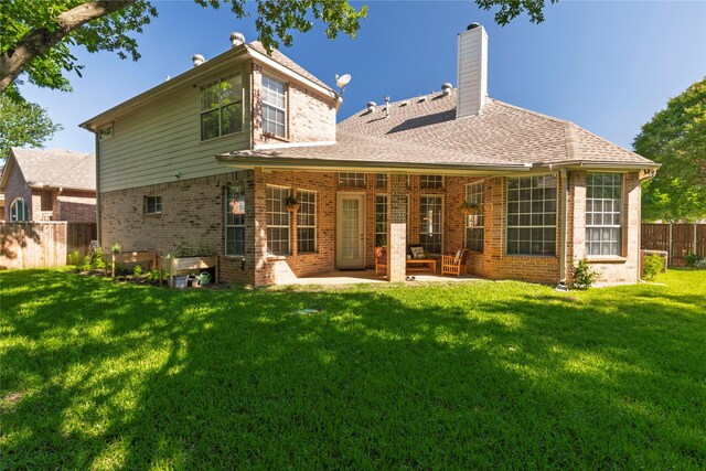 4301 Sandra Lynn Dr, Flower Mound, TX 75022 - rear view of house with brick siding, a patio, a chimney, and a shingled roof