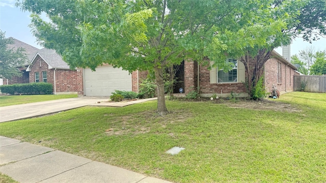 1924 Cliffrose Dr, Little Elm, TX 75068 - view of property hidden behind natural elements featuring an attached garage, brick siding, and driveway