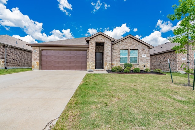 111 Seabiscuit Dr, Caddo Mills, TX 75135 - ranch-style home with a garage, concrete driveway, a front yard, brick siding, and stone siding