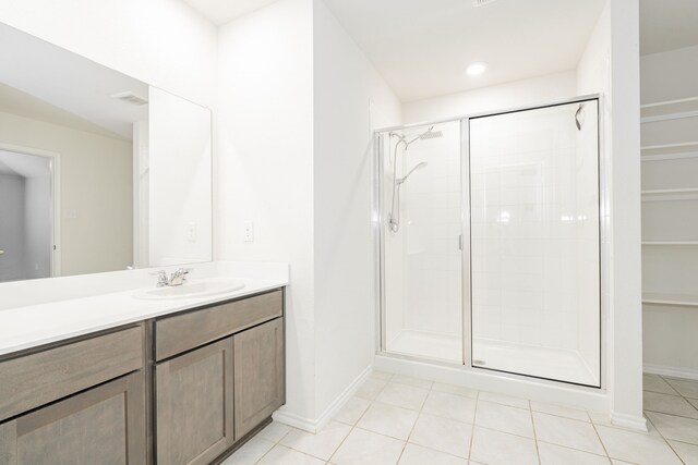 111 Seabiscuit Dr, Caddo Mills, TX 75135 - full bath featuring a shower stall, tile patterned floors, vanity, and baseboards