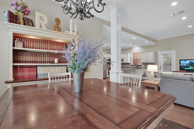 2920 Village Cir, Denison, TX 75020 - dining room featuring ornamental molding, radiator heating unit, ornate columns, recessed lighting, and a chandelier