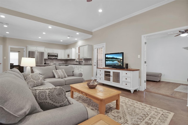 2920 Village Cir, Denison, TX 75020 - living room featuring ornamental molding, a ceiling fan, recessed lighting, and baseboards