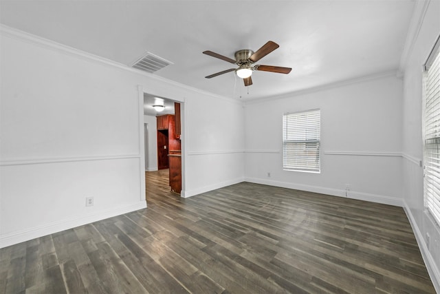 3617 Gene Ln, Haltom City, TX 76117 - spare room with ceiling fan, dark wood-style floors, baseboards, and crown molding