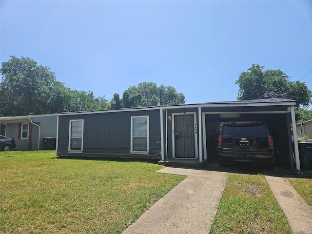 120 E Marguerita Dr, Garland, TX 75040 - view of front of property featuring a front lawn, driveway, and a carport