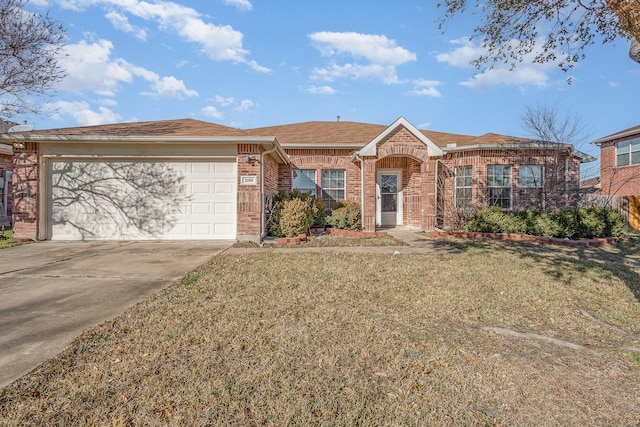 2109 Northridge Dr, Forney, TX 75126 - ranch-style house featuring brick siding, concrete driveway, a front yard, and a garage