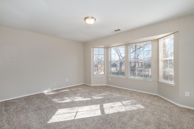 2109 Northridge Dr, Forney, TX 75126 - unfurnished room with carpet flooring, healthy amount of natural light, and baseboards