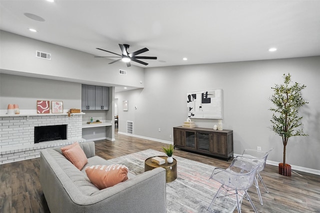 6005 Redwood Ln, Rowlett, TX 75089 - living area with a ceiling fan, baseboards, wood finished floors, recessed lighting, and a fireplace