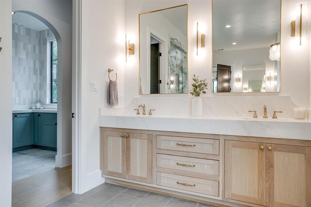 7758 Barber Ranch Rd, Fort Worth, TX 76126 - bathroom featuring double vanity, tile patterned floors, and tasteful backsplash