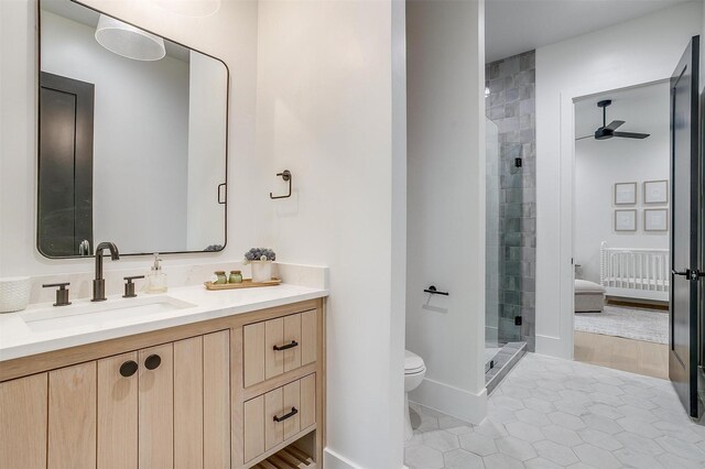 7758 Barber Ranch Rd, Fort Worth, TX 76126 - full bath with toilet, a shower stall, ceiling fan, tile patterned floors, and vanity