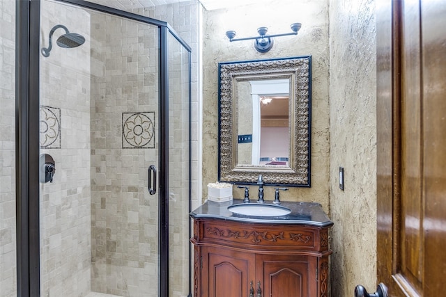 1950 Hidden Vly, Rockwall, TX 75087 - bathroom featuring a stall shower and vanity