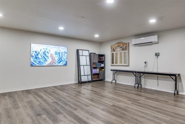 1950 Hidden Vly, Rockwall, TX 75087 - interior space featuring a wall mounted AC, recessed lighting, wood finished floors, and baseboards