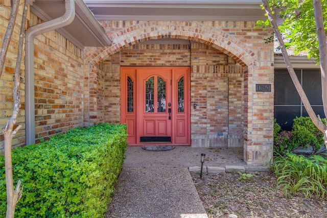 1950 Hidden Vly, Rockwall, TX 75087 - doorway to property featuring brick siding