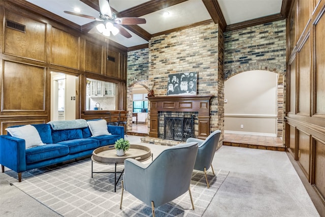 1950 Hidden Vly, Rockwall, TX 75087 - living area featuring a high ceiling, ceiling fan, a brick fireplace, light carpet, and beamed ceiling