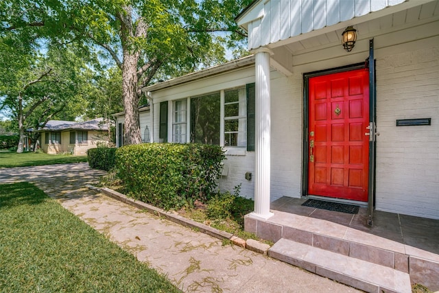 1405 Southwood Blvd, Arlington, TX 76013 - property entrance with brick siding and a yard