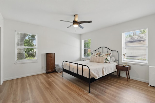 810 Turner Blvd, Grand Prairie, TX 75050 - bedroom featuring light wood-style flooring, baseboards, and ceiling fan