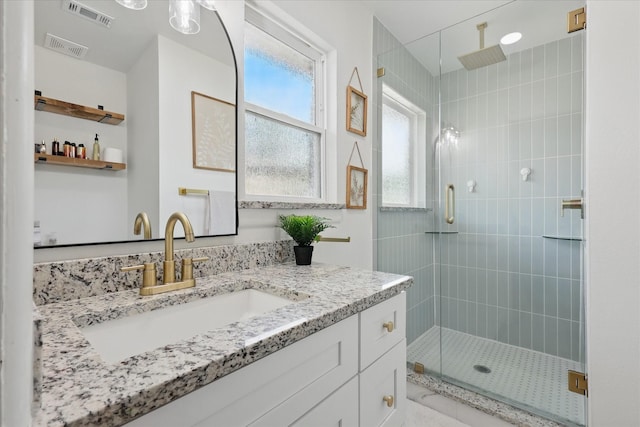 810 Turner Blvd, Grand Prairie, TX 75050 - full bath with a shower stall, plenty of natural light, and vanity