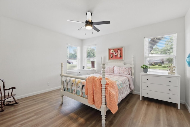 810 Turner Blvd, Grand Prairie, TX 75050 - bedroom featuring wood finished floors, baseboards, and a ceiling fan