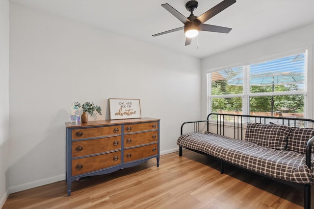 810 Turner Blvd, Grand Prairie, TX 75050 - bedroom featuring baseboards, light wood-type flooring, and a ceiling fan