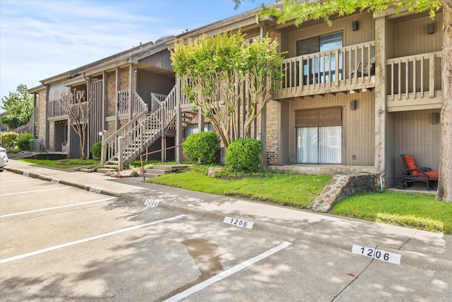 1206 Signal Ridge Pl, Rockwall, TX 75032 - view of building exterior featuring uncovered parking