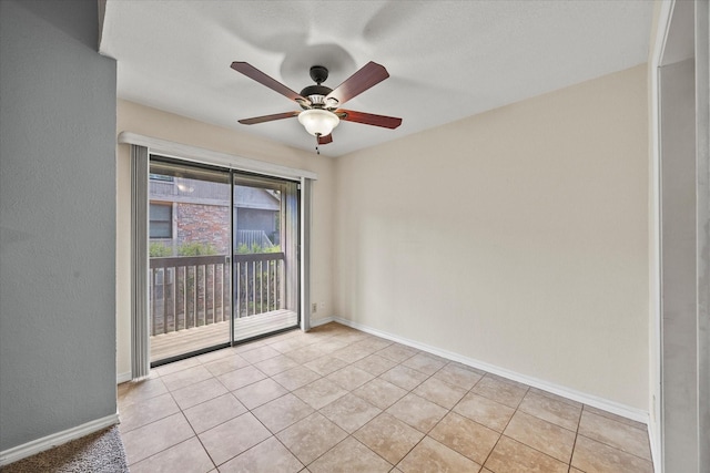 1206 Signal Ridge Pl, Rockwall, TX 75032 - empty room featuring ceiling fan, light tile patterned floors, and baseboards