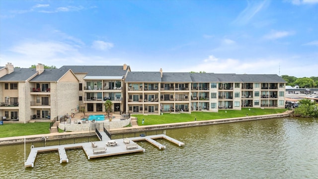 401 E Pearl St Unit 2105, Granbury, TX 76048 - dock area featuring a water view and a patio
