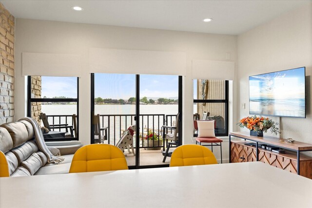 401 E Pearl St Unit 2105, Granbury, TX 76048 - sitting room with light wood-style flooring and baseboards