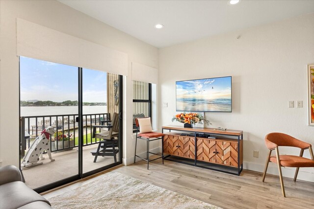 401 E Pearl St Unit 2105, Granbury, TX 76048 - sitting room with wood finished floors, recessed lighting, a water view, and baseboards