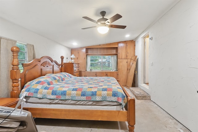 604 S Chestnut St, Winnsboro, TX 75494 - bedroom featuring multiple windows, concrete floors, lofted ceiling, and ceiling fan